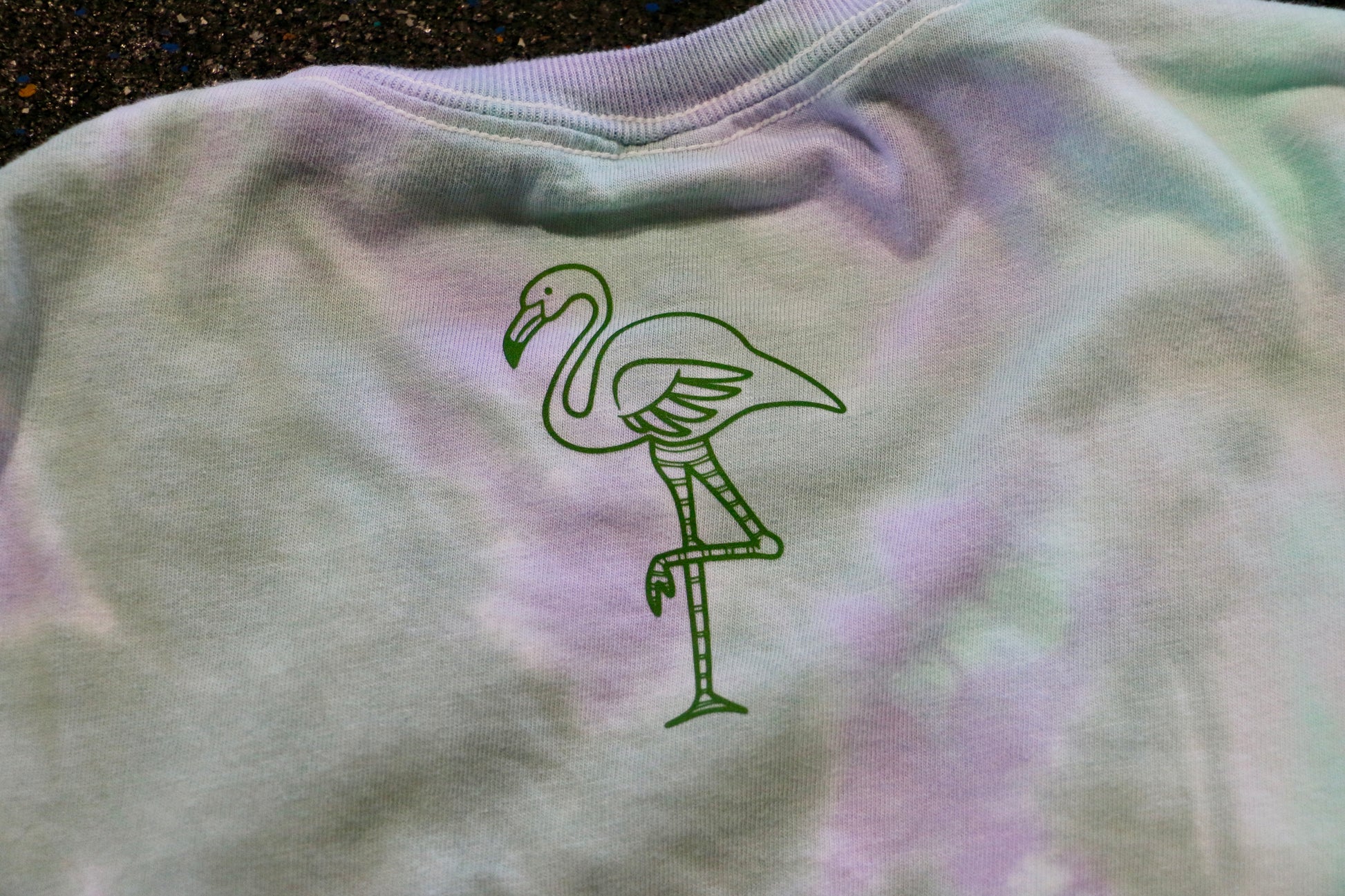 Flamingo on back of Flager hand written tee